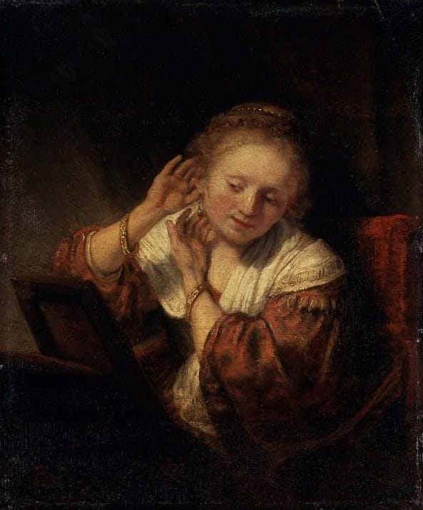 Mujer joven probándose pendientes – Rembrandt van Rijn Rembrandt van Rijn 2024-09-20 2